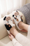 Chaussons rigolos motif vache noir et blanc, chauds et amusants, touche d'humour cosy pour la maison