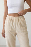 Pantalon pyjama femme polaire écru, taille élastiquée poches et bas resserré jogging, vue de face