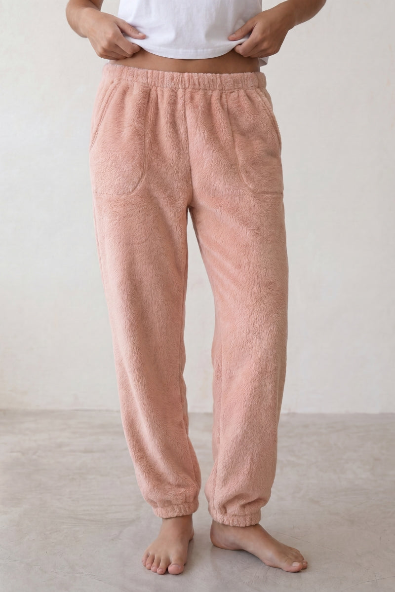 Pantalon pyjama femme polaire rose, taille élastiquée et bas resserré jogging, vue de face