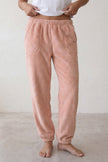 Pantalon pyjama femme polaire rose, taille élastiquée et bas resserré jogging, vue de face