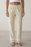 Pantalon pyjama femme écru à pompons, vue de face détaillée