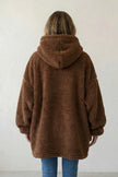 Pull plaid marron à capuche, vue de dos