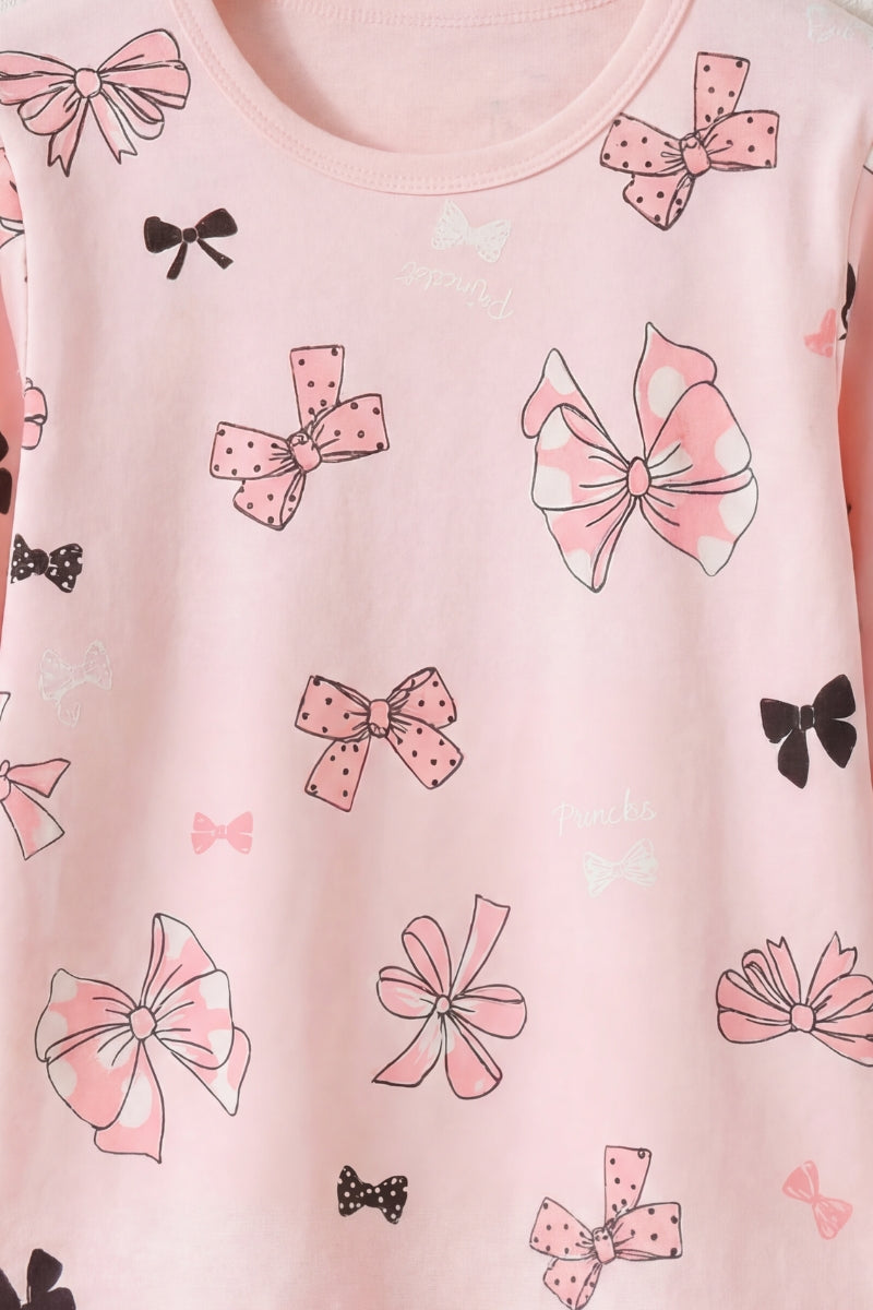 Pyjama nœuds fille, détail du motif nœuds papillon