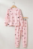 Pyjama nœuds fille, ensemble haut et pantalon présenté sur cintre