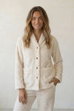Pyjama pilou pilou col châle femme écru, veste boutonnée gaufrée et pantalon assorti, vue de face