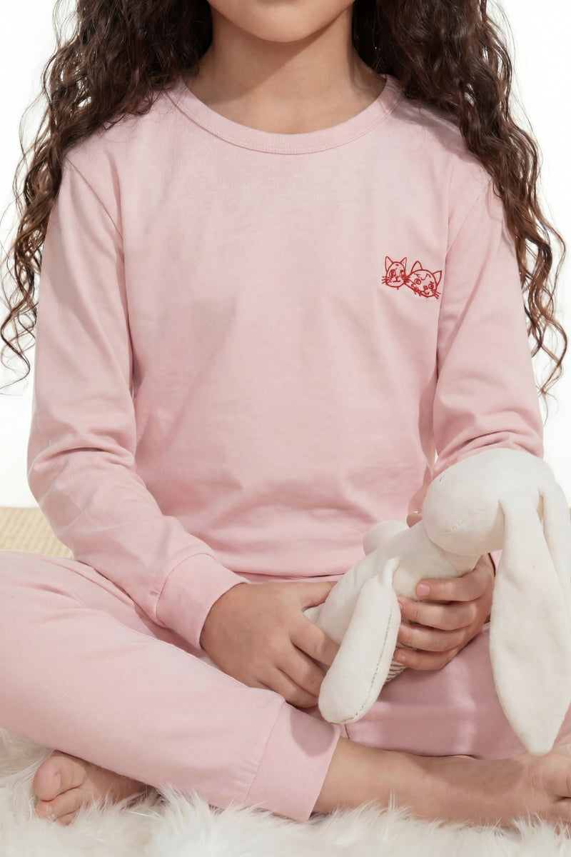 Pyjama rose fille en coton doux, haut à manches longues et pantalon assorti, vue de face