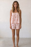 Pyjama short rose femme à volants, caraco à bretelles et short assorti, vue de face